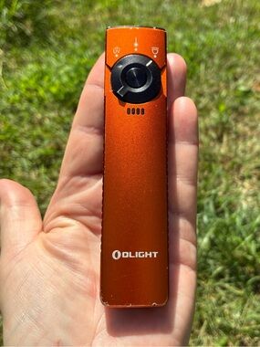 🔦 Exclusive Olight Arkfeld Pro Orange LED Triple Light Source Flat Portable